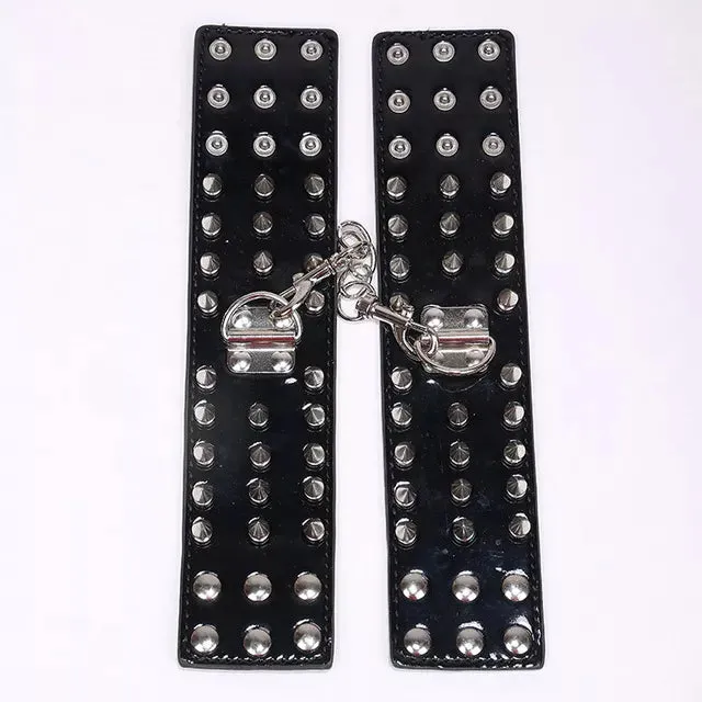 JOYGASMS Patent PU Leather Wrist Restraints with Three Row Metal Cone Spikes Black Shiny Handcuffs JOYGASMS Restraints